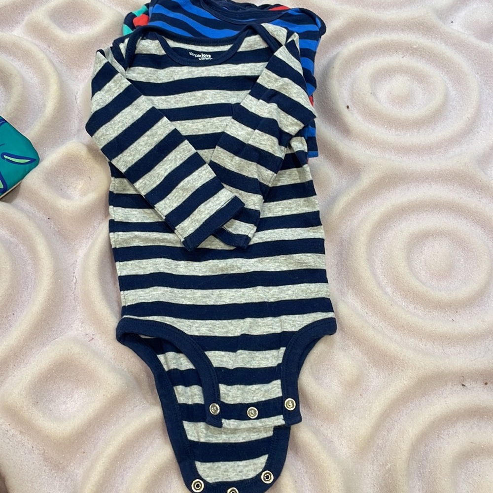 Long sleeve body suits, soft material 6-9 months, tiny pocket detail